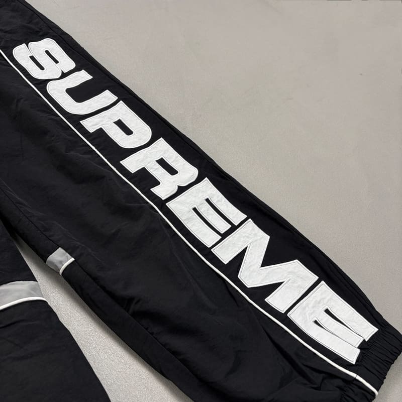 Calça Supreme S Paneled Track Preto
