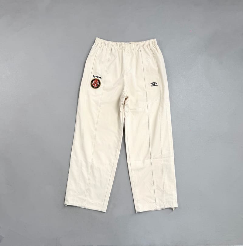 Conjunto Supreme x Umbro Cotton Ripstop Track Stone