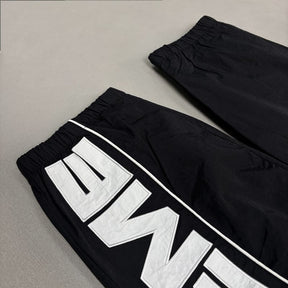 Calça Supreme S Paneled Track Preto