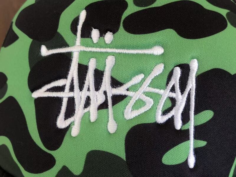 Boné BAPE x Stussy Trucker Green