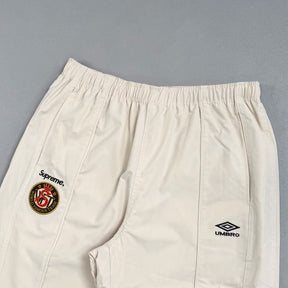 Conjunto Supreme x Umbro Cotton Ripstop Track Stone
