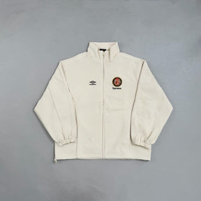 Conjunto Supreme x Umbro Cotton Ripstop Track Stone