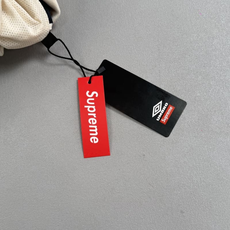 Conjunto Supreme x Umbro Cotton Ripstop Track Stone