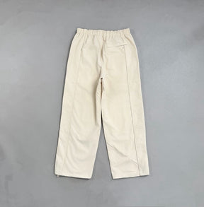 Conjunto Supreme x Umbro Cotton Ripstop Track Stone